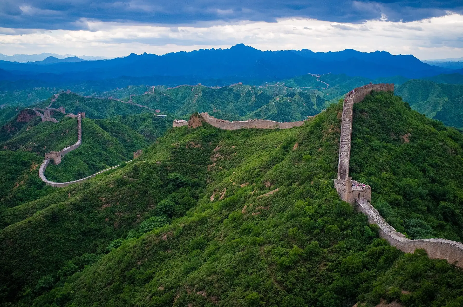 The Great Wall winding over green hills at Jinshanling
