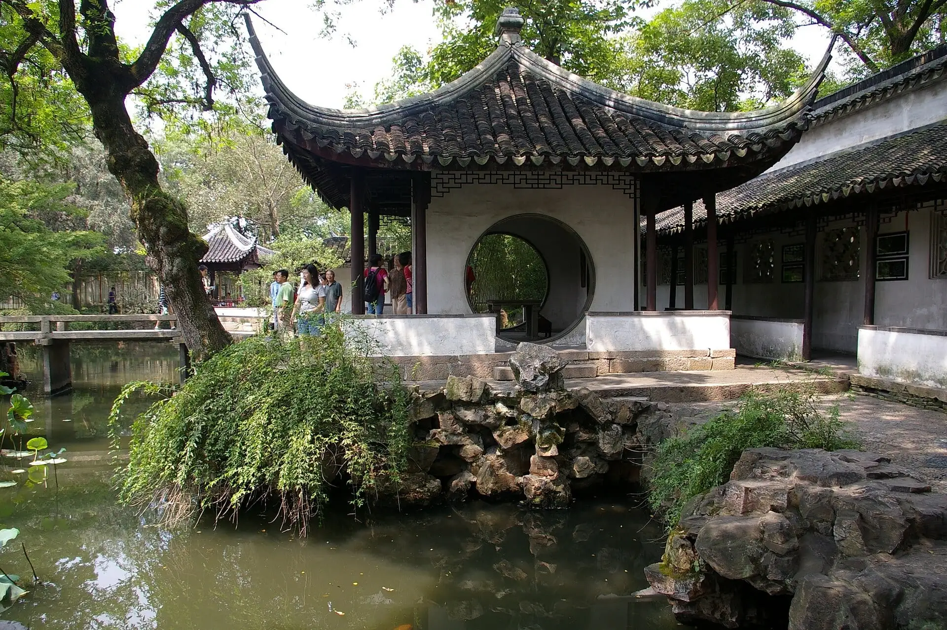 A pavilion with a round moon gate in the Humble Administrator's Garden, Suzhou